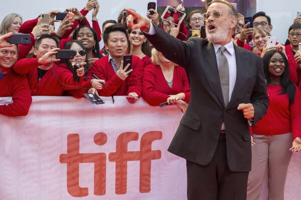 Actor Tom Hanks arrives for the Gala Premiere of the film "A Beautiful Day In The Neighborhood" at the 2019 Toronto International Film Festival on Saturday, Sept. 7, 2019. (Frank Gunn/The Canadian Press via AP)