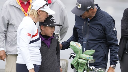 Annika Sorenstam, of Sweden, and Mike McGee congratulate their son, Will McGee, after he hit shot to the seventh green during a practice round for the U.S. Women's Open golf tournament at the Pebble Beach Golf Links, Wednesday, July 5, 2023, in Pebble Beach, Calif. (AP Photo/Darron Cummings)