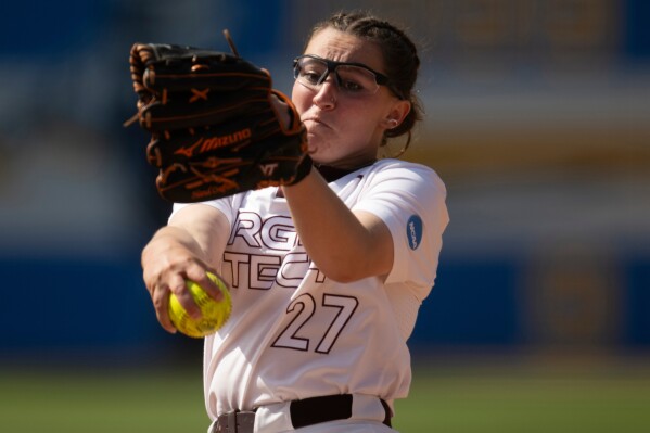 Virginia Tech starting pitcher Emma Lemley (27) delivers a pitch during an NCAA softball game against San Diego State on Friday, May 17, 2024, in Los Angeles. (AP Photo/Kyusung Gong, File)