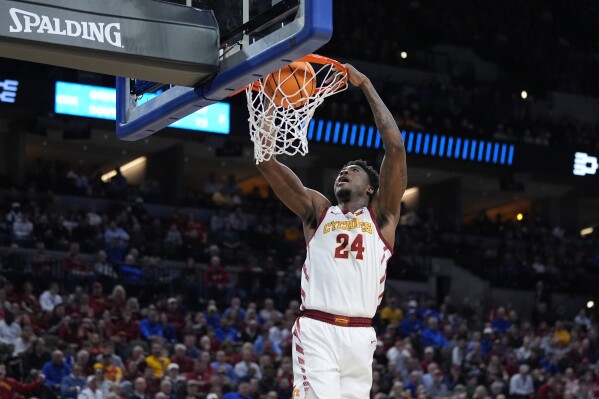Iowa State's Hason Ward (24) dunks during the second half of a first-round college basketball game against South Dakota State in the NCAA Tournament Thursday, March 21, 2024, in Omaha, Neb. (AP Photo/Charlie Neibergall)