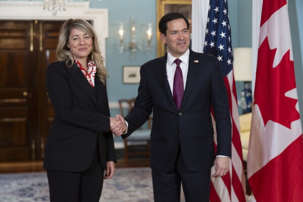 Secretary of State Marco Rubio greets Canada's Minister of Foreign Affairs Mélanie Joly in the Treaty Room at the State Department, Wednesday, Jan. 29, 2025. (AP Photo/Manuel Balce Ceneta)