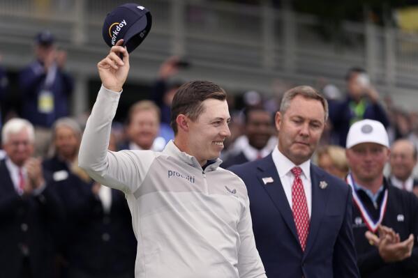 Matthew Fitzpatrick, of England, celebrate after winning the U.S. Open golf tournament at The Country Club, Sunday, June 19, 2022, in Brookline, Mass. (AP Photo/Charles Krupa)