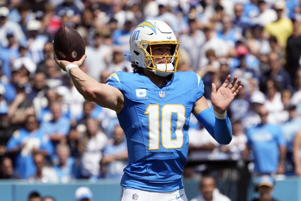Los Angeles Chargers quarterback Justin Herbert throws during the first half of an NFL football game against the Tennessee Titans Sunday, Sept. 17, 2023, in Nashville, Tenn. (AP Photo/George Walker IV)