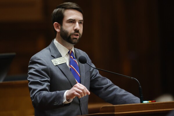 FILE - State Rep. Houston Gaines, R-Athens, speaks in favor of HB 231 in the House chambers during crossover day at the Georgia State Capitol, Monday, March 6, 2023, in Atlanta. Gaines said on Wednesday, Nov. 22, 2023 that he believed lawmakers could quickly fix a problem that is blocking the operation of a commission to discipline and remove prosecutors.(AP Photo/Alex Slitz, File)