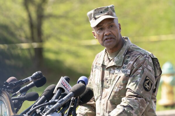 Brig. Gen. Michael J. Talley, commander of U.S. Army Medical Research and Development Command Fort Detrick, Md., speaks during a news conference near the scene of a shooting at a business park in Frederick, Md., Tuesday, April 6, 2021. (AP Photo/Carolyn Kaster)