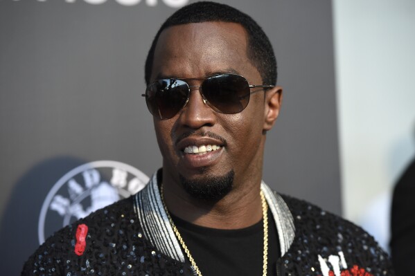 FILE - Sean "Diddy" Combs appears at the premiere of "Can't Stop, Won't Stop: A Bad Boy Story" on June 21, 2017, in Beverly Hills, Calif. Combs is asking the New York Supreme Court to enforce a 2021 agreement that requires Diageo to treat his DeLeon tequila brand “at least as favorably” as its other tequila brands. Combs signed the agreement with London-based Diageo __ which owns more than 200 brands, including Guinness beer and Tanqueray gin __ after what he says were years of neglect for DeLeon, a brand he established with Diageo in 2013. (Photo by Chris Pizzello/Invision/AP, File)