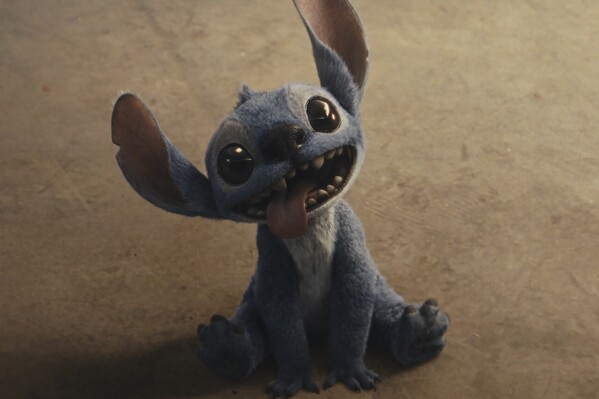 This image shows the character Stitch in a still from the film "Lilo & Stitch." (Walt Disney Studios Motion Pictures via AP)