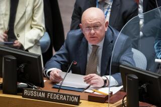 FILE - Vassily Nebenzia, permanent representative of Russia to the United Nations, speaks during a meeting of the UN Security Council, March 29, 2022, at United Nations headquarters. Nebenzia is dismissing U.S. and European Union claims that its presidency of the Security Council in April 2023 is an "April Fool's" joke. (AP Photo/John Minchillo, File)