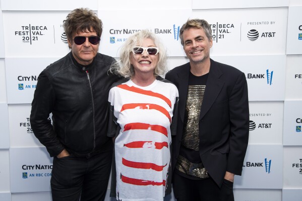 FILE - Clem Burke, from left, Debbie Harry and Rob Roth attend a screening of "Blondie: Vivir En La Habana" during the 20th Tribeca Festival in New York on June 16, 2021. The band Blondie is among the nominees for the 2024 Songwriters Hall of Fame. (Photo by Charles Sykes/Invision/AP, File)