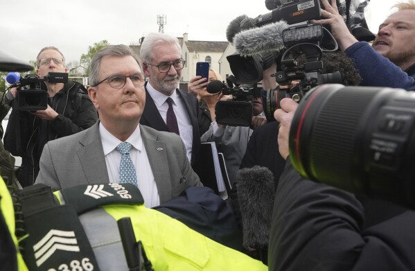 Former DUP leader Sir Jeffrey Donaldson arrives at Newry Magistrates' Court, where he is charged with several historical sexual offences, in Newry, Northern Ireland, Wednesday April 24, 2024. Sir Jeffrey resigned as DUP leader and was suspended from the party following the charges. (Niall Carson/PA via AP)