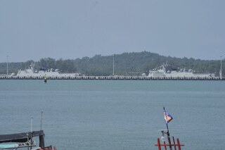 Chinese warships dock at a naval base's pier during an official inauguration of the Ream Naval Base in Sihanoukville, southwestern of Phnom Penh, Cambodia, Saturday, April 5, 2025. (AP Photo/Heng Sinith, File)