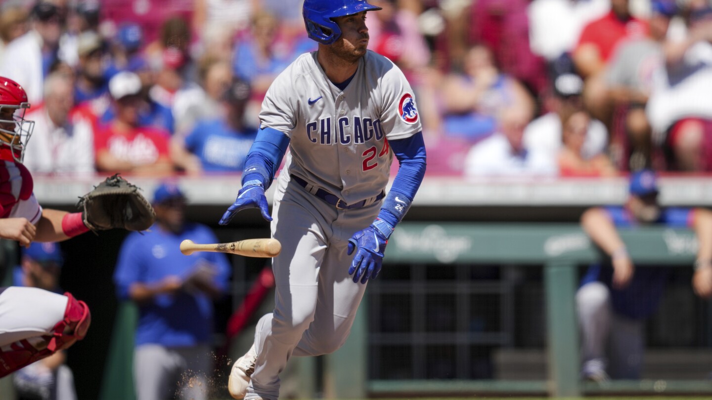 Fowler helps Cubs rally for 5-2 win over Reds