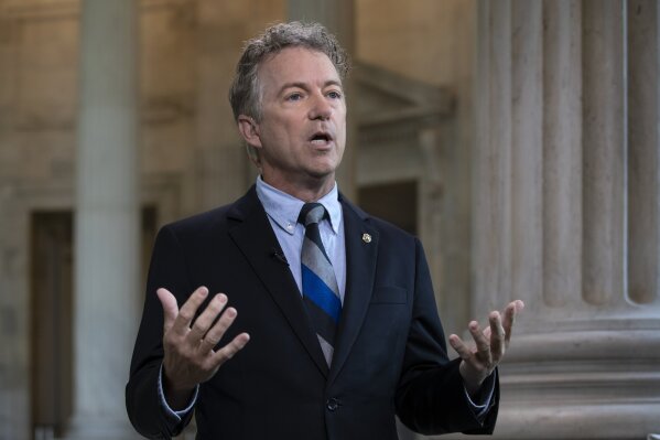 
              FILE - In this July 17, 2018 file photo, Sen. Rand Paul, R-Ky., talks during a television interview on Capitol Hill in Washington. The Senate has blocked legislation to stop an estimated $300 million in arms sales to Bahrain. Lawmakers rejected a call by Republican Sen. Rand Paul to send a message that the U.S. is "done with the war in Yemen." (AP Photo/J. Scott Applewhite)
            