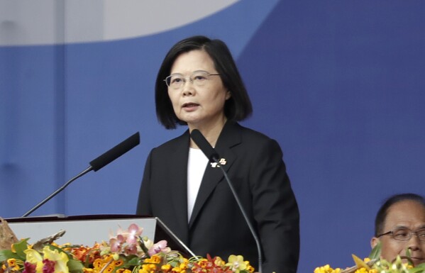 Taiwanese President Tsai Ing-wen delivers a speech during National Day celebrations in front of the Presidential Building in Taipei, Taiwan, Tuesday, Oct. 10, 2023. (AP Photo/Chiang Ying-ying)