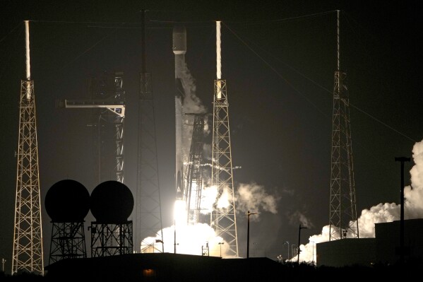 A SpaceX Falcon 9 rocket on NASA's Plankton, Aerosol Cloud Ocean Ecosystem (PACE) mission lifts off from Space Launch Complex 40 at the Cape Canaveral Air Force Station in Cape Canaveral, Fla., Thursday, Feb. 8, 2024. NASA’s newest climate satellite rocketed into orbit to survey the world’s oceans and atmosphere in never-before-seen detail. (AP Photo/John Raoux)