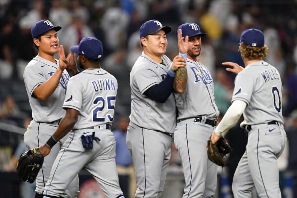 Tampa Bay Rays' Randy Arozarena, right, celebrates with Isaac Paredes after  hitting a three-run home run during the first inning of a baseball game  against the New York Yankees, Tuesday, Aug. 16