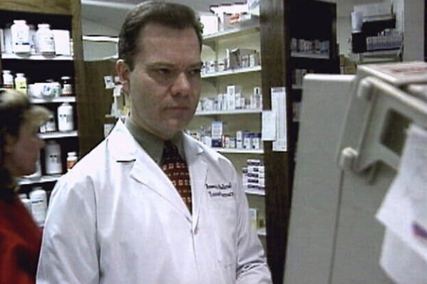 FILE - Robert Courtney, a wealthy pharmacist who is accused of diluting chemotherapy drugs, is seen in this image from television released on Aug. 15, 2001, in Kansas City, Mo. The former Kansas City-area pharmacist who has been incarcerated for more than two decades in a profit-boosting scheme to dilute tens of thousands of prescriptions for seriously ill patients is being moved to a halfway house this summer, an attorney for the victims said Tuesday, April 16, 2024. (KMBC-TV via AP, File)