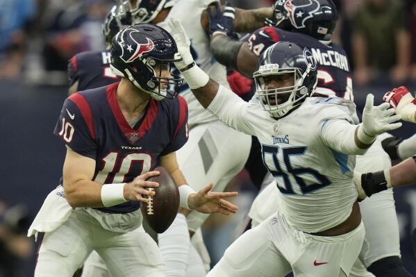 Titans clinch AFC's top seed with 28-25 win over Texans