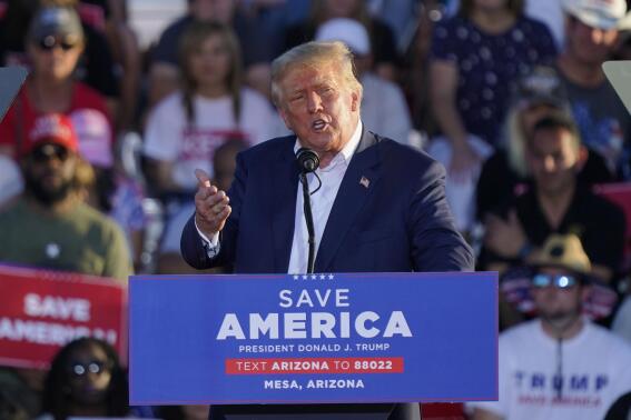 FILE - Former President Donald Trump speaks at a rally, Oct. 9, 2022, in Mesa, Ariz. Trump has been teasing another presidential run since before he left the White House. But aides to the former president are now preparing for a 2024 campaign that could be announced soon after next week's midterms. (AP Photo/Matt York, File)