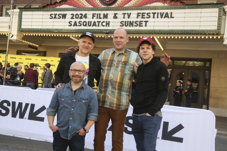 Christophe Zajac-Denek, David Zellner, Nathan Zellner and Jesse Eisenberg, from front left, arrive for the Texas premiere of "Sasquatch Sunset" at the Paramount Theatre during the South by Southwest Film Festival on Monday, March 11, 2024, in Austin, Texas. (Photo by Jack Plunkett/Invision/AP)