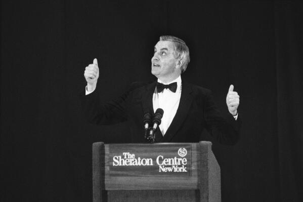 FILE - In this Wednesday, Oct. 11, 1984, file photo, presidential candidate Walter Mondale gestures while speaking at a Democratic fundraising dinner, in New York. Mondale, a liberal icon who lost the most lopsided presidential election after bluntly telling voters to expect a tax increase if he won, died Monday, April 19, 2021. He was 93. (AP Photo/Richard Drew, File)