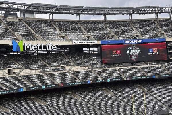 Metlife Stadium in East Rutherford, N.J. is shown Wednesday, Nov. 1, 2023. The 2024 NHL Stadium Series will take place outdoors at MetLife Stadium Feb. 17-18, 2024. The NHL is envisioning doing the same thing Taylor Swift did over the summer: sell out 82,000-seat MetLife Stadium multiple times when the New York Rangers and Islanders and then the New Jersey Devils and Philadelphia Flyers face off at the home of the NFL’s Jets and Giants. (AP Photo/Stephen Whyno)