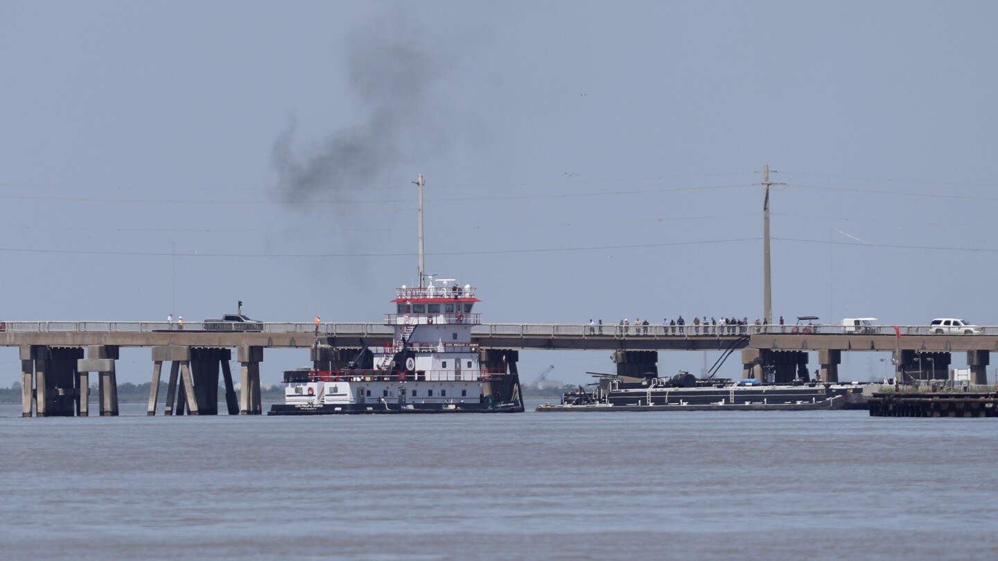 A barge hit a bridge in Galveston, Texas, spilling oil into surrounding waters and closing the only road to a small island. Officials did not have any