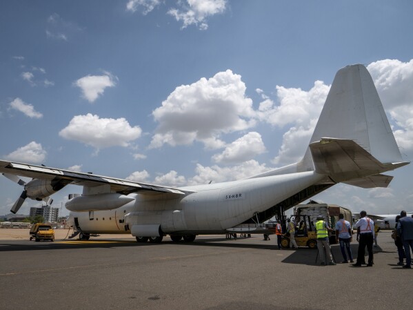 A Fogbow aid plane is loaded at an airport in Juba, South Sudan, on Monday, June 9, 2025, before conducting airdrops of food in the Upper Nile region. (AP Photo/ Florence Mettiaux)