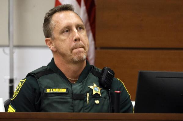 FILE - Broward Sheriff's Office Sgt. Richard Van Der Eems describes the scene he encountered at the school after the mass shooting as he testifies during the penalty phase trial of Marjory Stoneman Douglas High School shooter Nikolas Cruz, Friday, July 22, 2022, at the Broward County Courthouse in Fort Lauderdale, Fla. (Mike Stocker/South Florida Sun-Sentinel via AP, Pool, File)