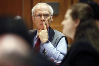 FILE - Wisconsin Secretary of State Doug La Follette listens to Assistant Attorney General Maria Lazar make her opening arguments at a hearing in front of Dane County Circuit Judge Maryann Sumi at the Dane County Courthouse in Madison, Wis., March 29, 2011. Longtime secretary of state, Democrat La Follette, says he is preparing to run for reelection to the office he was first elected to in 1974 and that he's held since 1983. (AP Photo/Michael P. King, Pool File)