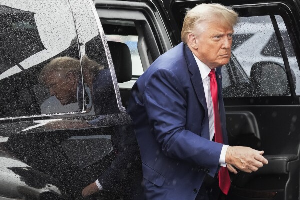 FILE - Former President Donald Trump arrives to board his plane at Ronald Reagan Washington National Airport, Thursday, Aug. 3, 2023, in Arlington, Va., after facing a judge on federal conspiracy charges that allege he conspired to subvert the 2020 election. (AP Photo/Alex Brandon, File)