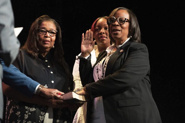 Former 6th District City Councilwoman Sharon Tucker is sworn in as mayor at the Clyde Theatre on Tuesday morning, April 23, 2024, in Fort Wayne, Ind. (Stan Sussina/The Journal-Gazette via AP)