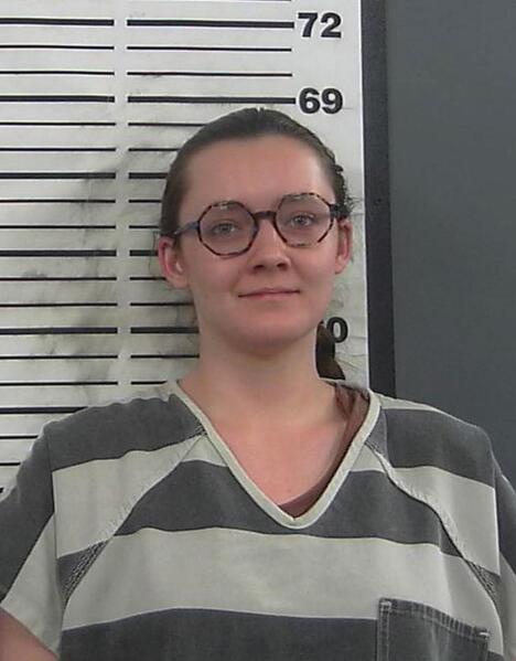 FILE - This booking photo provided by the Platte County Sheriff's Office shows Lorna Roxanne Green on March 23, 2023 in Wheatland, Wyo. The college student who authorities say admitted setting fire to a building being turned into Wyoming's only full-service abortion clinic is set to appear in federal court Friday, June 2, to enter a plea to an arson charge. (Platte County Sheriff's Office via AP, File)