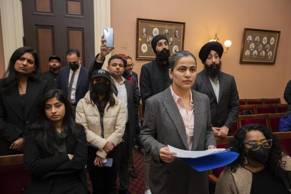Califiornia state Sen. Aisha Wahab, foreground, listens to speakers during a news conference where she proposed SB 403, a bill which adds caste as a protected category in the state’s anti-discrimination laws, in Sacramento, Calif., Wednesday, March 22, 2023. California may become the first state in the nation to outlaw caste-based bias, a safeguard people of South Asian descent say is necessary to protect them from discrimination in housing, education and the tech sector where they hold key roles. (AP Photo/José Luis Villegas)