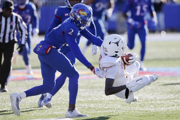 Texas Football returns to run first offense to defeat Kansas 55-14