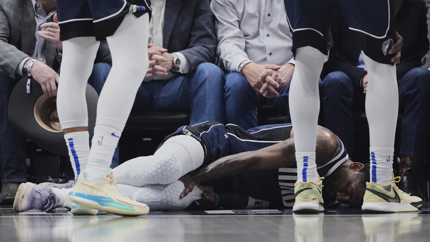 Mavs star Kyrie Irving has a torn ACL and is out for the season, AP source says