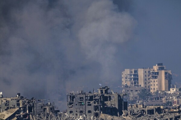 Smoke rises after an Israeli strike on the Gaza Strip on Saturday, Nov. 18, 2023. (AP Photo/Ariel Schalit)
