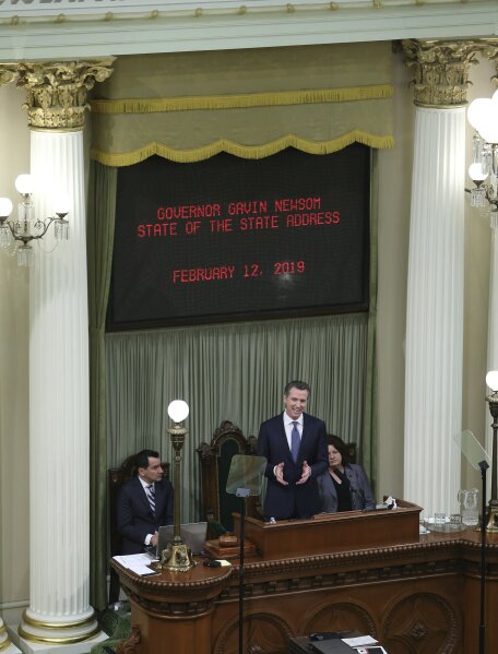 
              California Gov. Gavin Newsom delivers his first of state of the state address to a joint session of the legislature at the Capitol Tuesday, Feb. 12, 2019, in Sacramento, Calif. (AP Photo/Rich Pedroncelli)
            