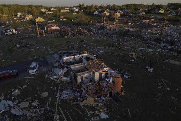 Destroyed homes are seen after a severe storm passed through the area, Saturday, May 17, 2025, in London, Ky. (AP Photo/Carolyn Kaster)