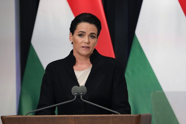 FILE - Hungarian President Katalin Novàk delivers her speech during Pope Francis' meeting with the authorities, civil society, and the diplomatic corps in the former Carmelite Monastery in Budapest, Hungary, Friday, April 28, 2023. Pressure is mounting on Hungary’s head of state to resign after it was revealed that she issued a presidential pardon to a man convicted as an accomplice in a child sexual abuse case. (AP Photo/Andrew Medichini, Pool, File)