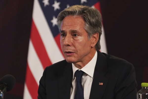 US Secretary of State Antony Blinken, right, speaks during a press conference after a meeting on security, at the National Palace in Mexico City, Thursday, Oct. 5, 2023. (AP Photo/Marco Ugarte )