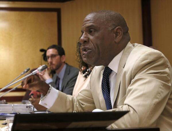 FILE - In this April 23, 2019 file photo, State Sen. Steven Bradford, D-Compton, speaks during a hearing at the Capitol in Sacramento, Calif. George Floyd's killing last year and the protests that followed led to a wave of police reforms in dozens of states, from changes in use-of-force policies to greater accountability for officers. At the same time, lawmakers in a handful of states have had success addressing racial inequities. Ahead of the verdict Tuesday, April 20, 2021 members of California’s Legislative Black Caucus gathered outside the Capitol to highlight police and criminal justice reform bills they hope to advance. Bradford, a Democrat who chairs the caucus says “The time is now for us to act." (AP Photo/Rich Pedroncelli, File)
