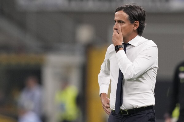 Inter Milan's head coach Simone Inzaghi reacts during the Serie A soccer match between Inter Milan and Sassuolo at the San Siro Stadium, in Milan, Italy, Wednesday, Sept. 27, 2023. (AP Photo/Antonio Calanni)