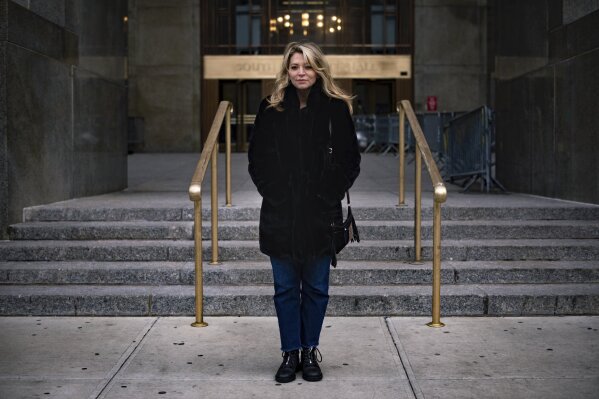 In this Jan. 27, 2020, photo, Actress Katherine Kendall poses for a portrait outside a New York courthouse where Harvey Weinstein is on trial for rape and sexual assault. Kendall claims the former movie mogul made unwanted sexual advances toward her during a meeting 1993. (AP Photo/Robert Bumsted)