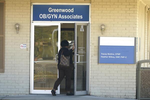 An individual enters the Greenwood OB/GYN Associates clinic across the street from the Greenwood Leflore Hospital in Greenwood, Miss., Oct. 21, 2022. (AP Photo/Rogelio V. Solis)