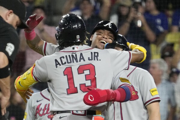 Acuña hits grand slam to become first player with 30 homers and 60