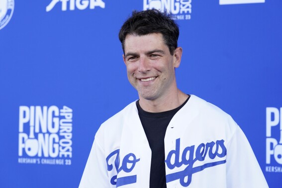 Actor Max Greenfield poses at the 10th Annual PingPong4Purpose celebrity ping pong tournament hosted by Los Angeles Dodgers pitcher Clayton Kershaw and his wife, Ellen, Thursday, July 27, 2023, at Dodger Stadium in Los Angeles. (AP Photo/Chris Pizzello)