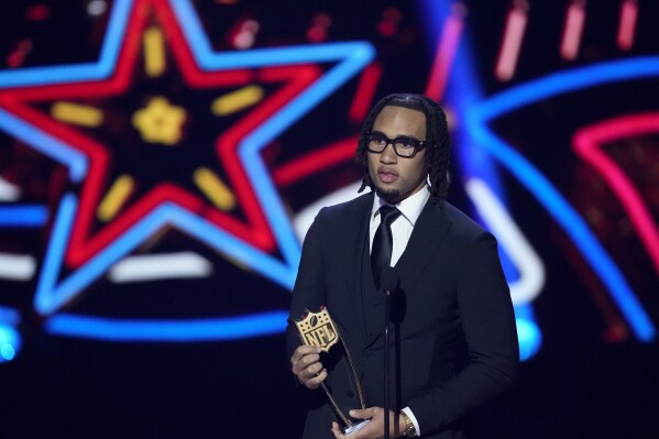 Houston Texans' C.J. Stroud, AP offensive rookie of the year speaks during the NFL Honors award show ahead of the Super Bowl 58 football game Thursday, Feb. 8, 2024, in Las Vegas. (AP Photo/David J. Phillip)