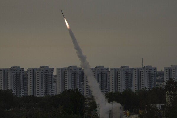 FILE - Israel's Iron Dome anti-missile system fires to intercept a rocket launched from the Gaza Strip towards Israel, near Ashkelon, Israel, Thursday, May 11, 2023. Since Israel activated the Iron Dome in 2011, the cutting-edge rocket-defense system has intercepted thousands of rockets fired from the Gaza Strip. By Israeli military estimates, Hamas has already fired 7,000 rockets into Israel during the current war. (AP Photo/Ariel Schalit, File)