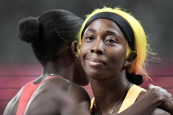 Shelly-Ann Fraser-Pryce, of Jamaica, wins a women's 100-meter semifinal at the 2020 Summer Olympics, Saturday, July 31, 2021, in Tokyo. (AP Photo/Petr David Josek)